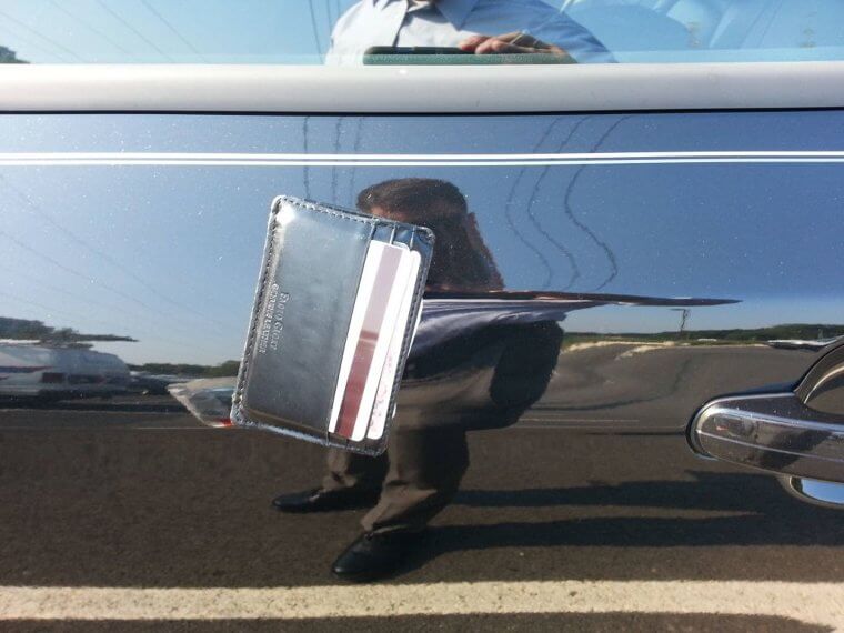 Wallet Falls From Roof, Sticks the Landing On the Door